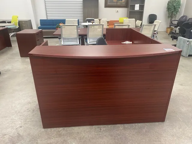 Mahogany reception desk in an office lobby