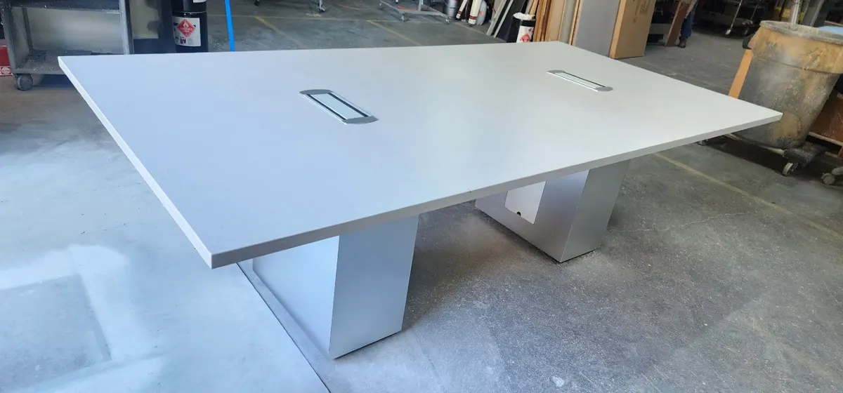 Eight-foot conference table with flip-up power and data module
