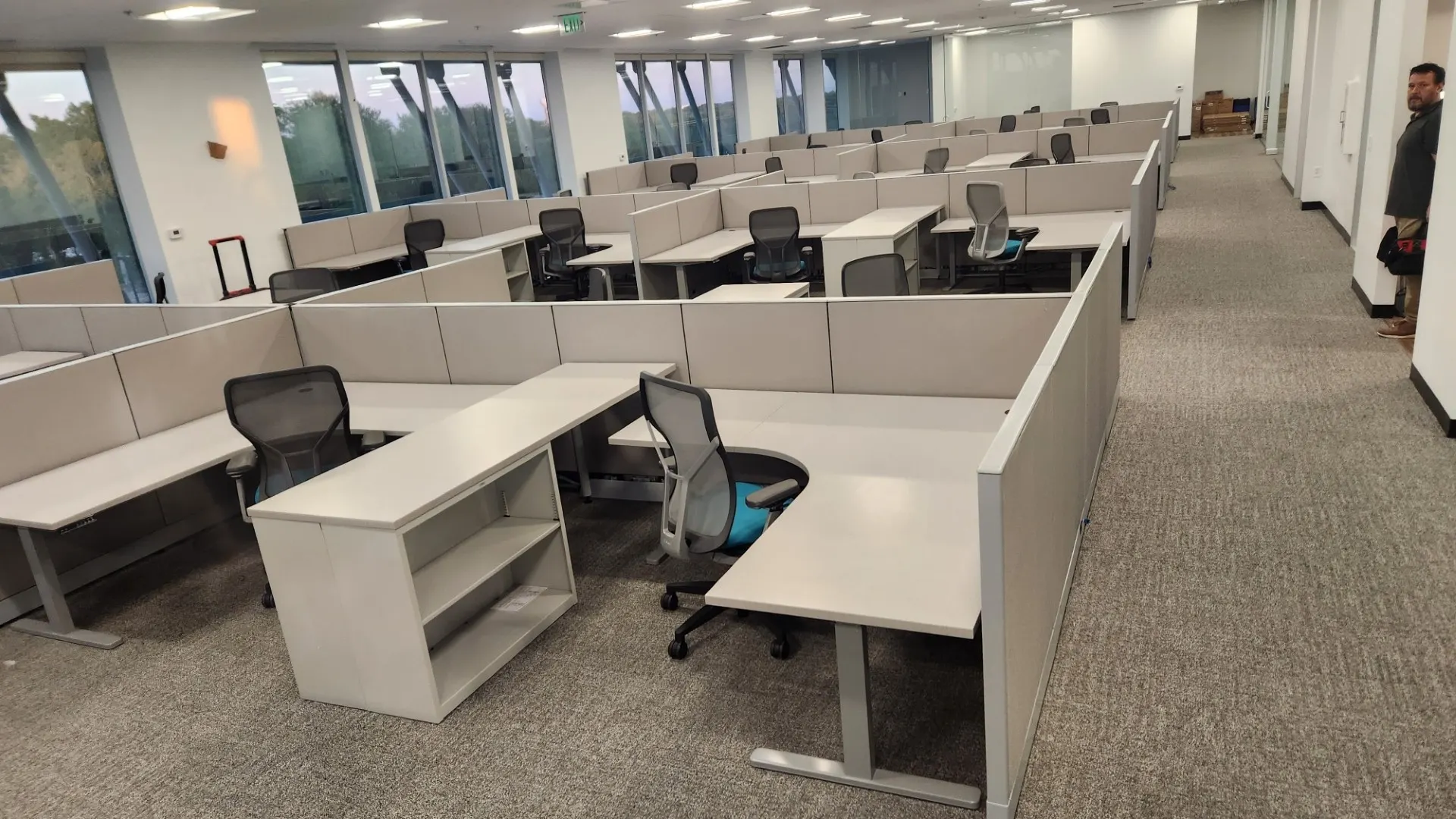 Open office floor with height-adjustable workstations installed by New Space in Houston