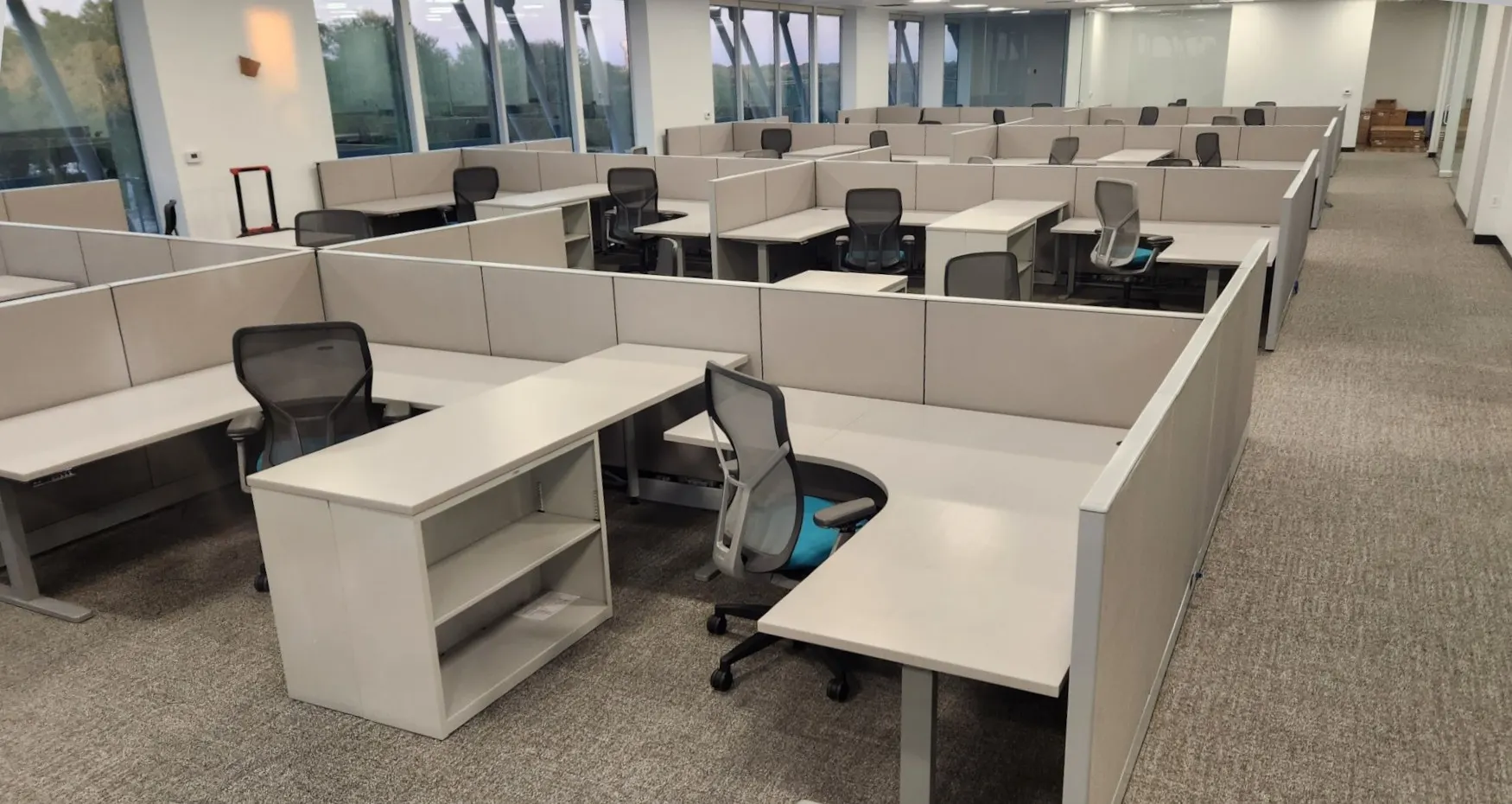Open office floor with height-adjustable workstations installed by New Space in Houston