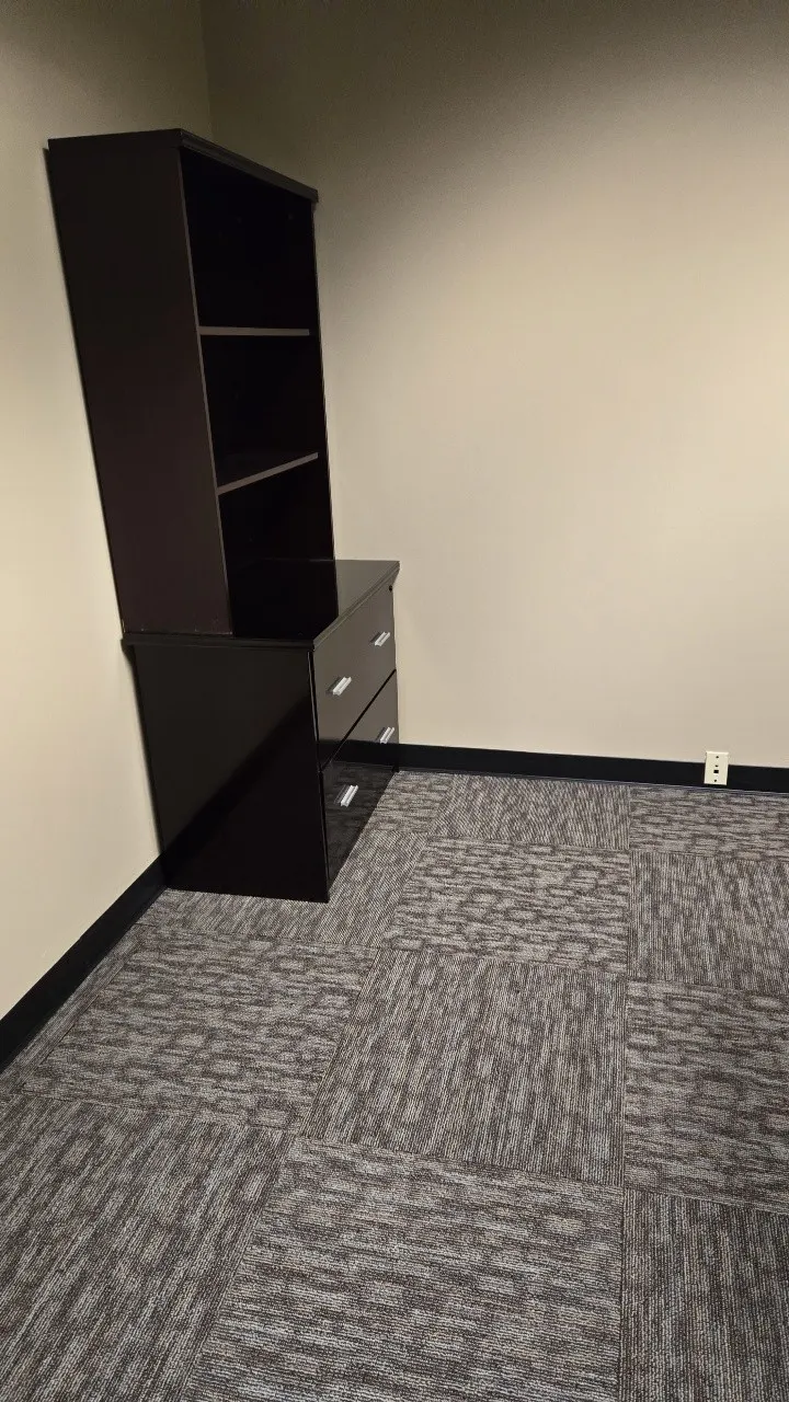 Lateral file cabinet with hutch storage in an office